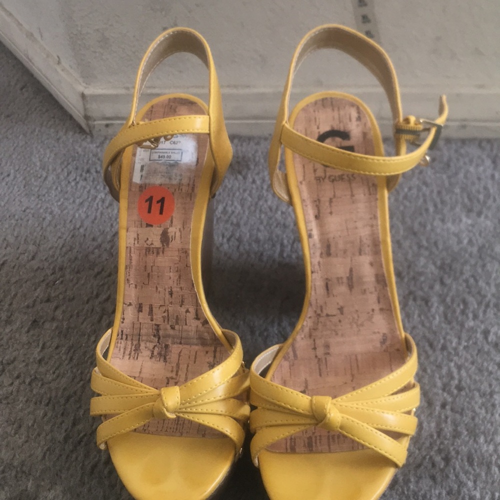 A beautiful size 11 Guess yellow sandals